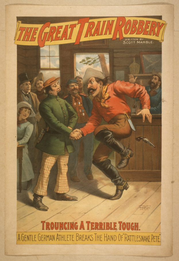 Ein Plakat mit einer Gruppe von Menschen auf dem Boden, einer hält eine Waffe, mit Text oben und unten: "Die große Zugraub - Trouching ein schreckliches Tough".