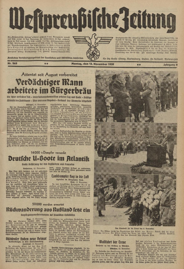 Eine Gruppe von Menschen in traditioneller deutscher Tracht feiert auf der Titelseite einer deutschen Zeitung vom 13. November 1939 mit der Schlagzeile "Weitpreubliche Zeitung".