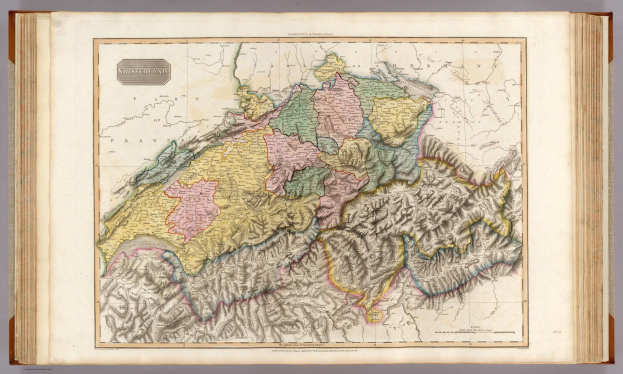 Ein altes Buch mit einer detaillierten Karte von der Schweiz, die ihre Länder und Regionen hervorhebt, mit begleitendem Text, der zusätzliche Informationen bietet.