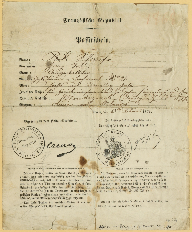Altes deutsches Regierungsdokument mit einem kreisförmigen, schwarz umrandeten Stempel auf vergilbtem Papier, das schwarze Schrift enthält.